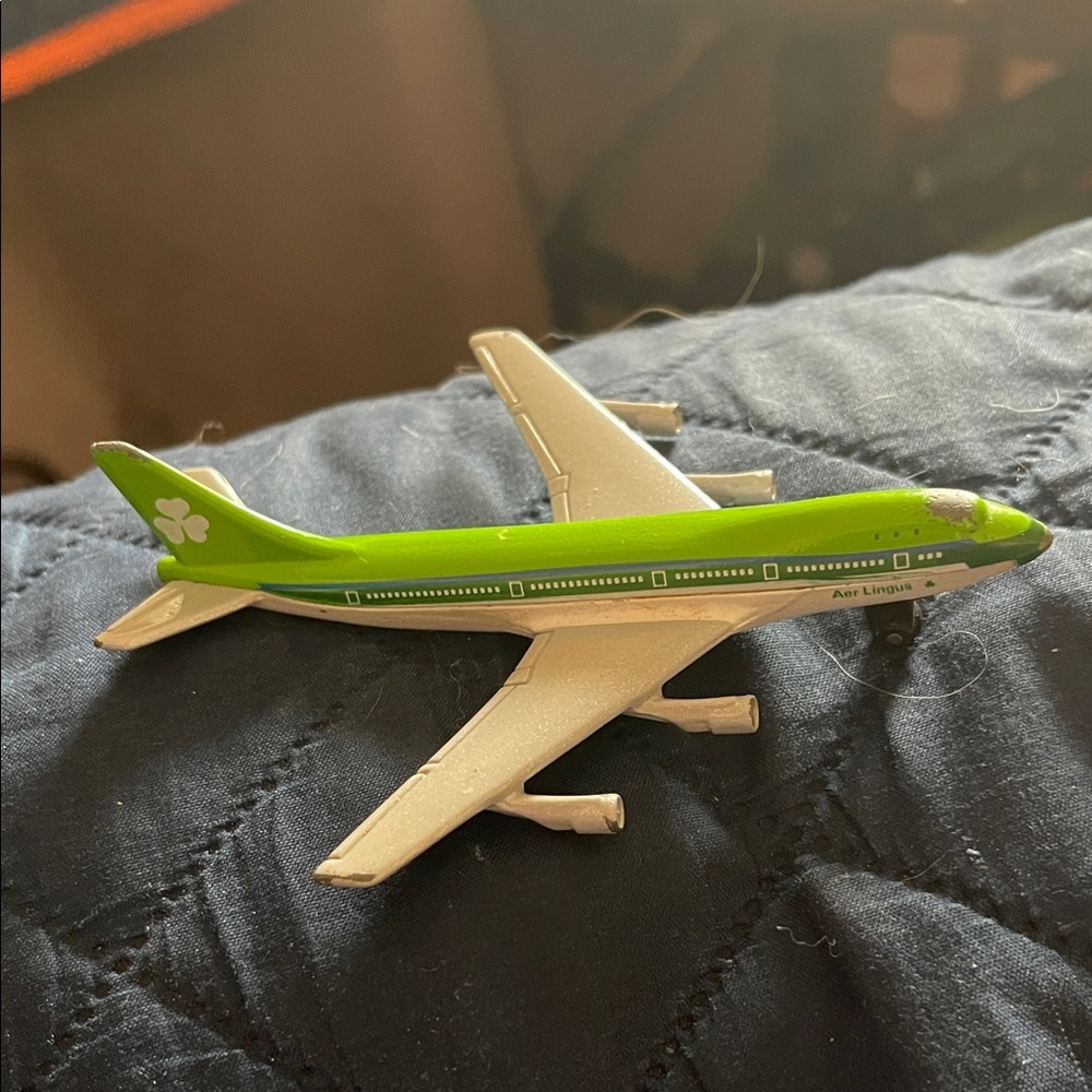 Green and White Toy Airplane